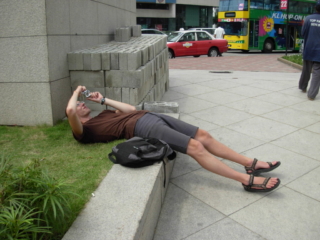 Andy taking a picture of  Petronas  Towers, Kuala Lumpur, Malaysia